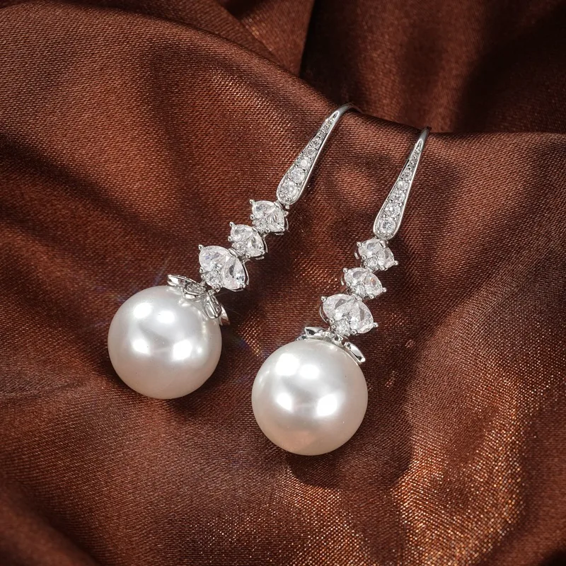  Элегантный серебряный цвет Имитация жемчуга Серьги-капли для женщин Мода Сверкающие серьги из циркона Свадебная вечеринка Ювелирные изделия Причудливые подарки